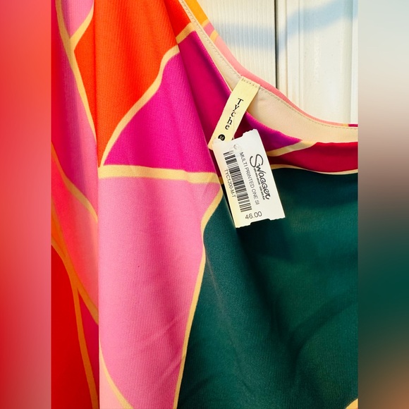 New with tags one shouldered, flowy blouse from local boutique. - Picture 2 of 3